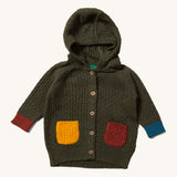 Little Green Radicals kids fern green knitted hooded cardigan with yellow and red pockets on a cream background.