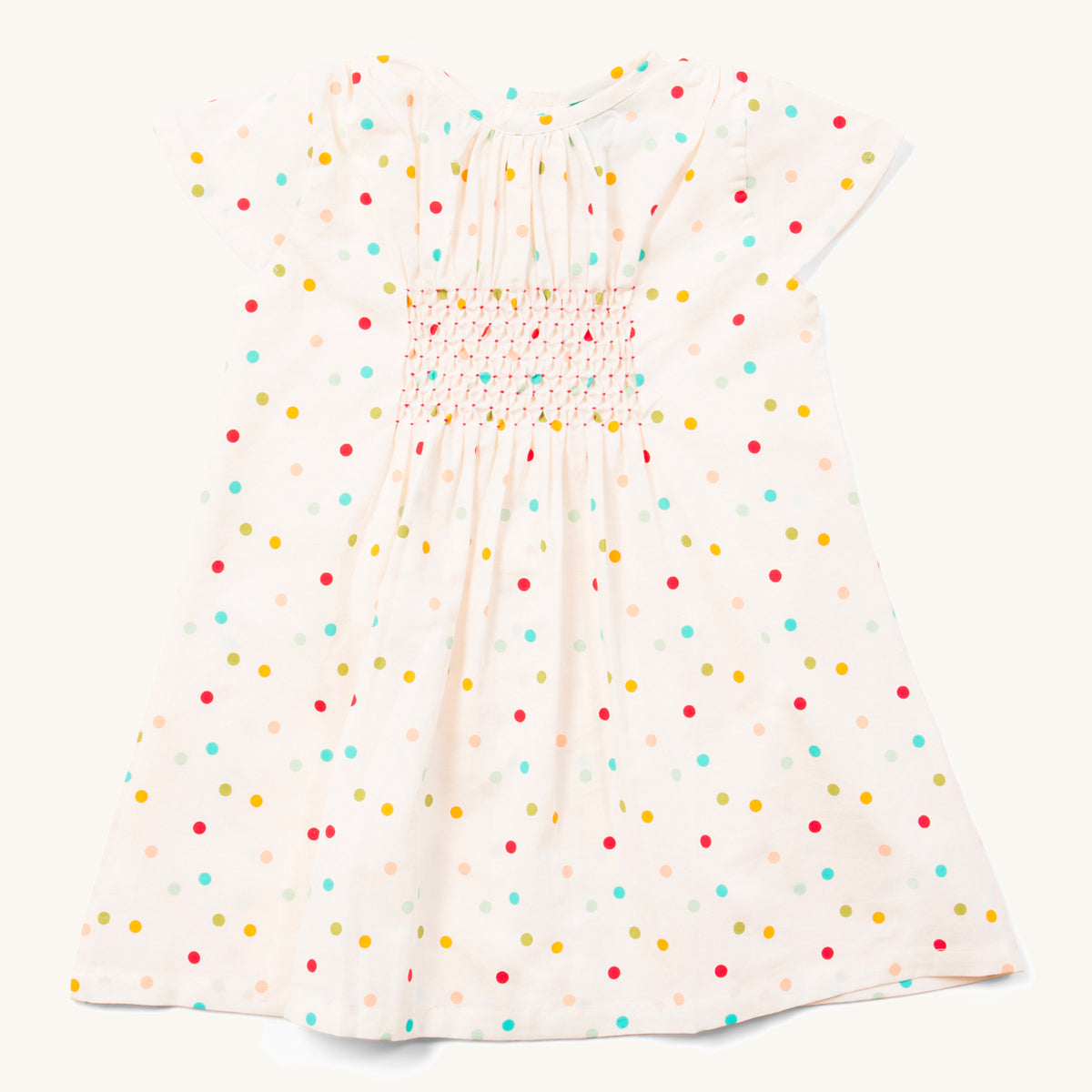 LGR children's organic cotton rainbow spots smock dress on a white background