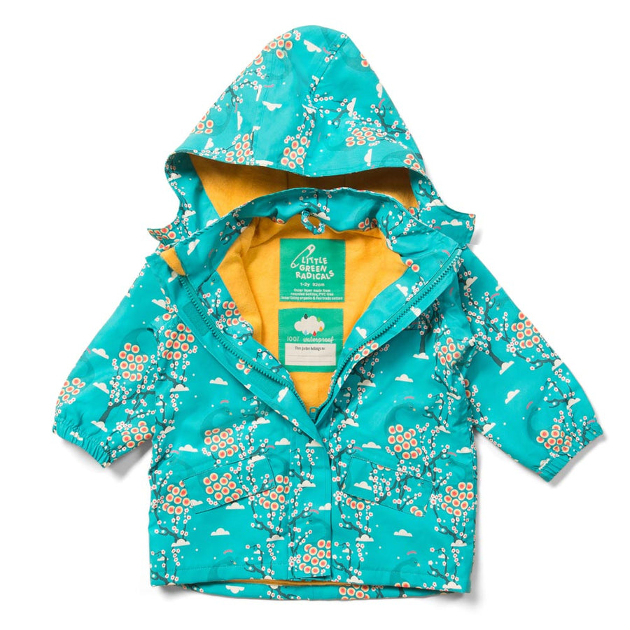 Little Green Radicals children's waterproof raincoat in the midnight peacock colour on a white background