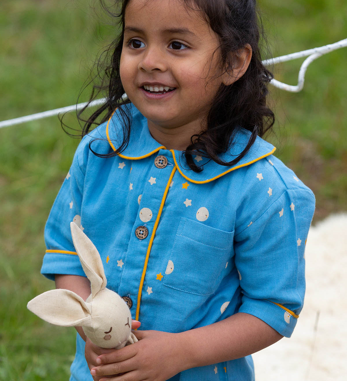  these beautiful light blue pyjama shorts and top have delicate stars and moon designs