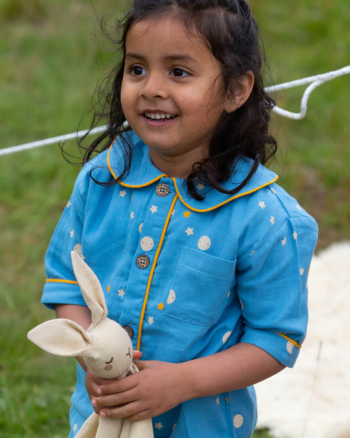  these beautiful light blue pyjama shorts and top have delicate stars and moon designs