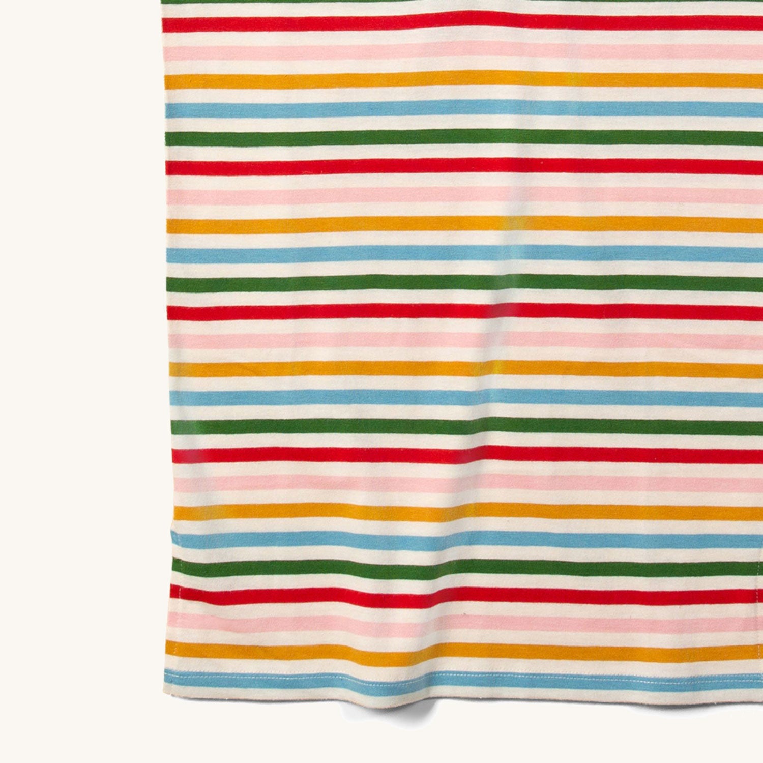 close up of the stripes on the LGR Adaptive Easy Feeding Rainbow Striped Henley Tunic