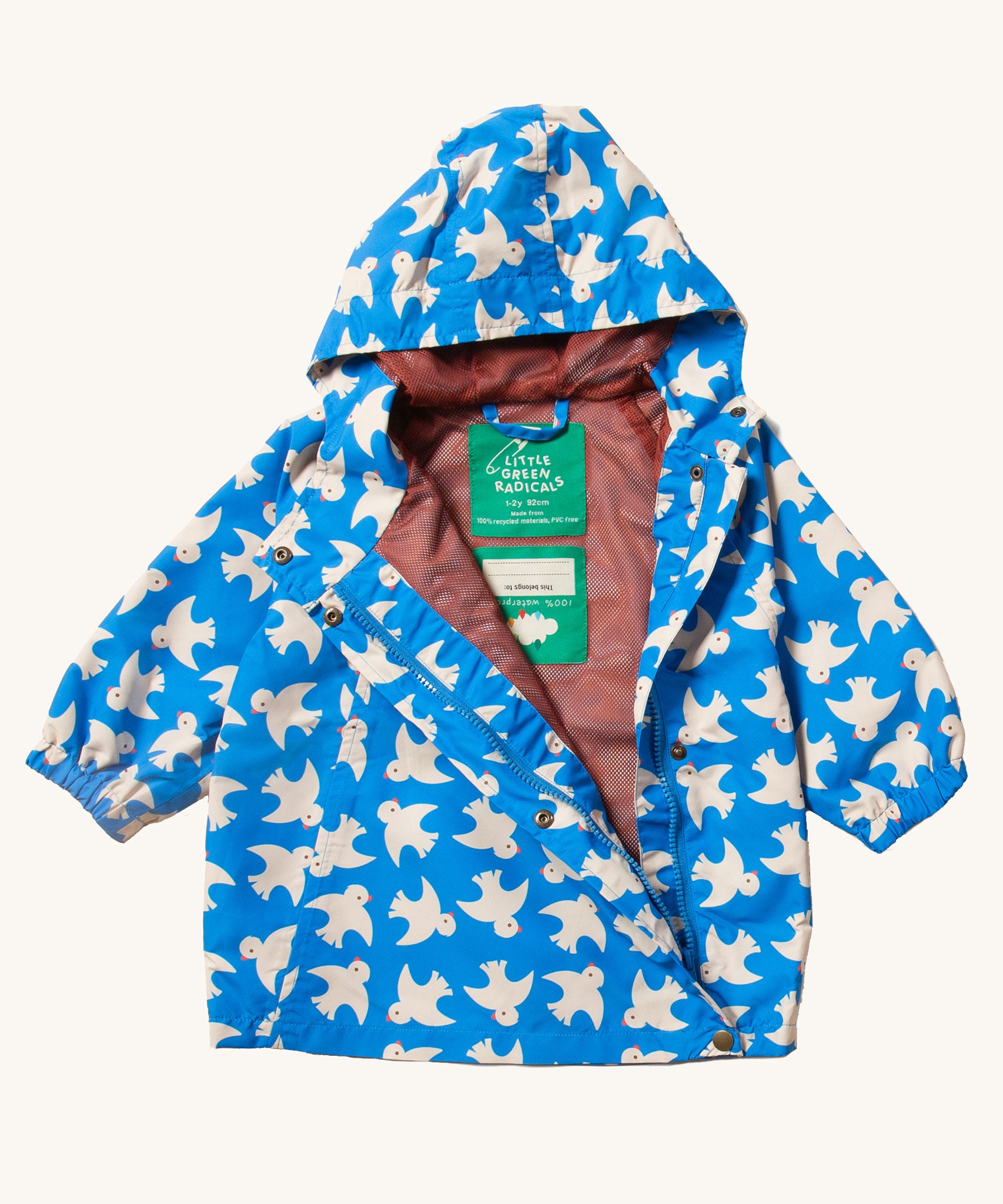 A Little Green Radicals Diving And Splashing Blue Recycled Waterproof Kids Packable Anorak shown with the zip nearly fully opened revealing the red coloured mesh lining inside. 