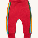 The back of the Little Green Radicals Red rainbow striped Organic Cotton Comfy Joggers with rainbow stripe on the sides