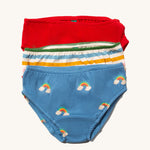 Little Green Radicals Organic Cotton Underwear Briefs Set in a 3 pack. One pair has a rainbow print on a blue background, one has multi coloured stripes and one is plain red.