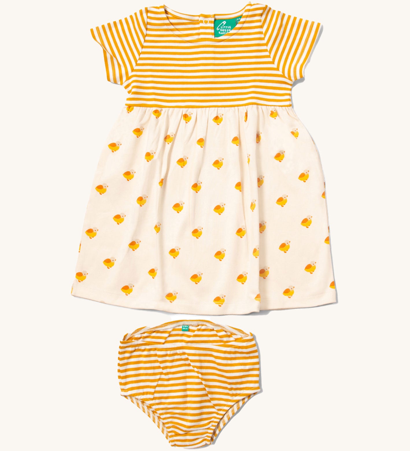 Little Green Radicals organic cotton Easy Peasy Summer Dress with a yellow stripe sleeve and upper body and a Little Ducks print skirt. Sizes up to 24 months have a matching pair of yellow striped nappy cover