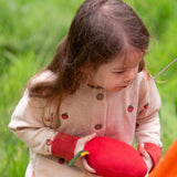 A child wearing the Little Green Radicals organic From One To Another Strawberry Days print child's Knitted Cardigan