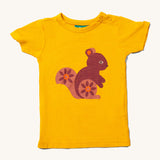 Little Green Radicals Golden Squirrel Short Sleeve T-Shirt. A yellow gold coloured organic cotton  t-shirt with a squirrel on the front. 