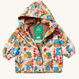 The Little Green Radicals Child's Flora & Fauna vintage style flower print Waterproof Raincoat with the zip opened slightly reveling the rest rust coloured mesh lining inside.