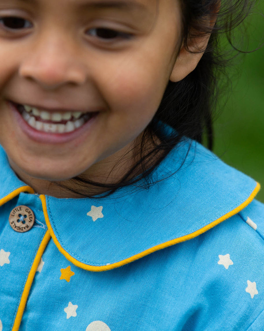  these beautiful light blue pyjama shorts and top have delicate stars and moon designs