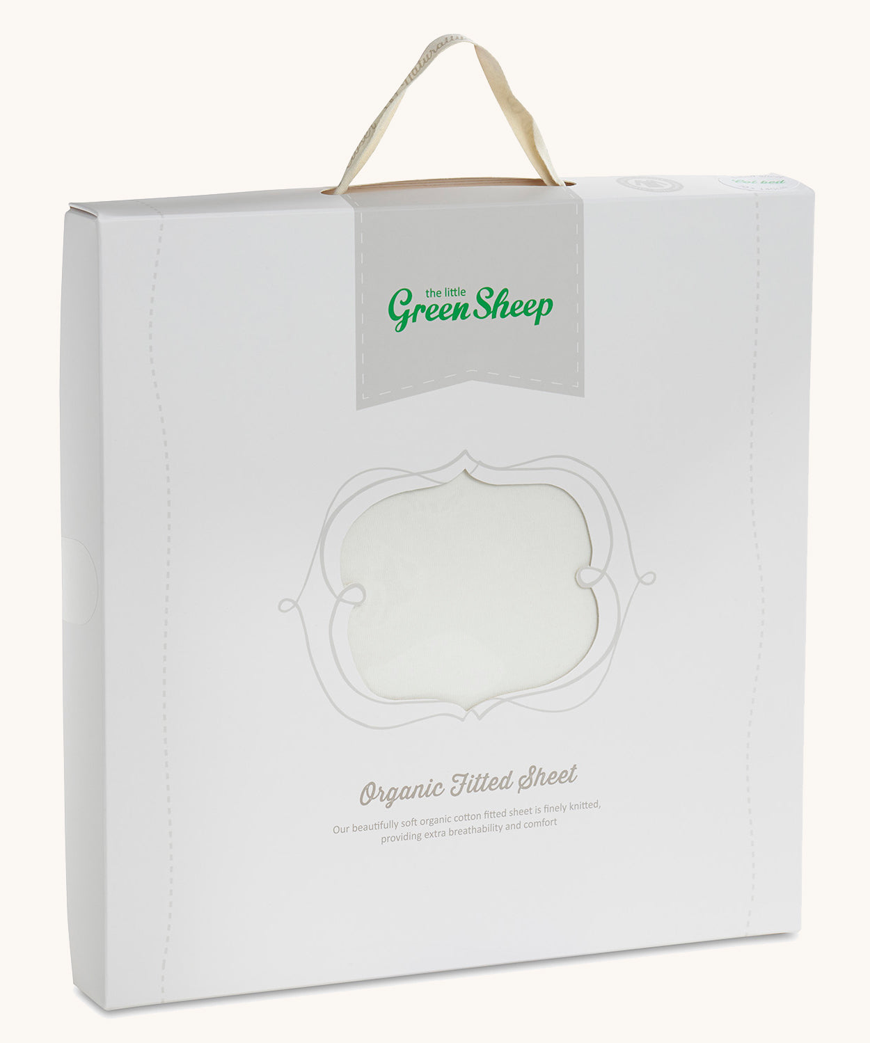 Little Green Sheep Organic Single Jersey Fitted Sheet in the packaging pictured on a plain background