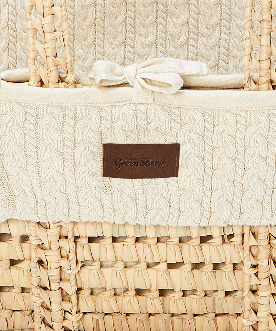 close up of the linen Little Green Sheep Organic Knitted Moses Basket & Mattress