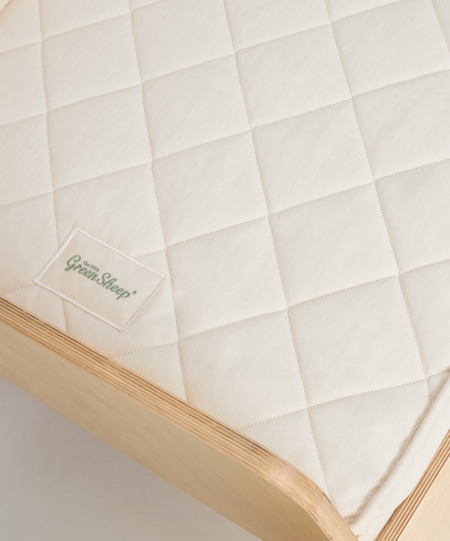 A close up of the Little Green Sheep twist mattress