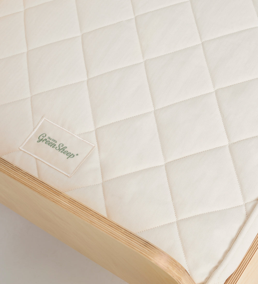 A close up of the Little Green Sheep twist mattress