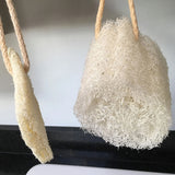 new and used LoofCo Washing-Up Pads pictured hanging up