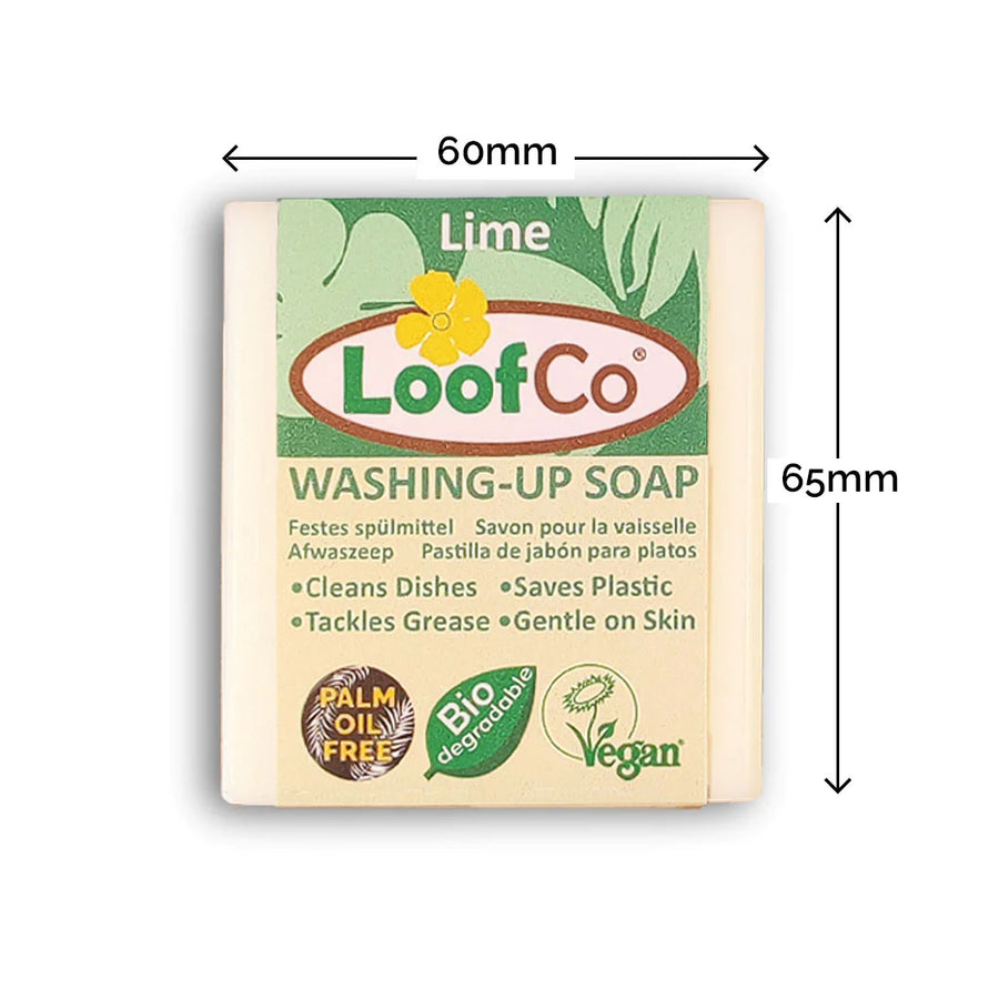 LoofCo Lime scented Washing-Up Dish Soap Bar in paper sleeve pictured on a plain white background with product dimensions. 60mm by 65mm approximate