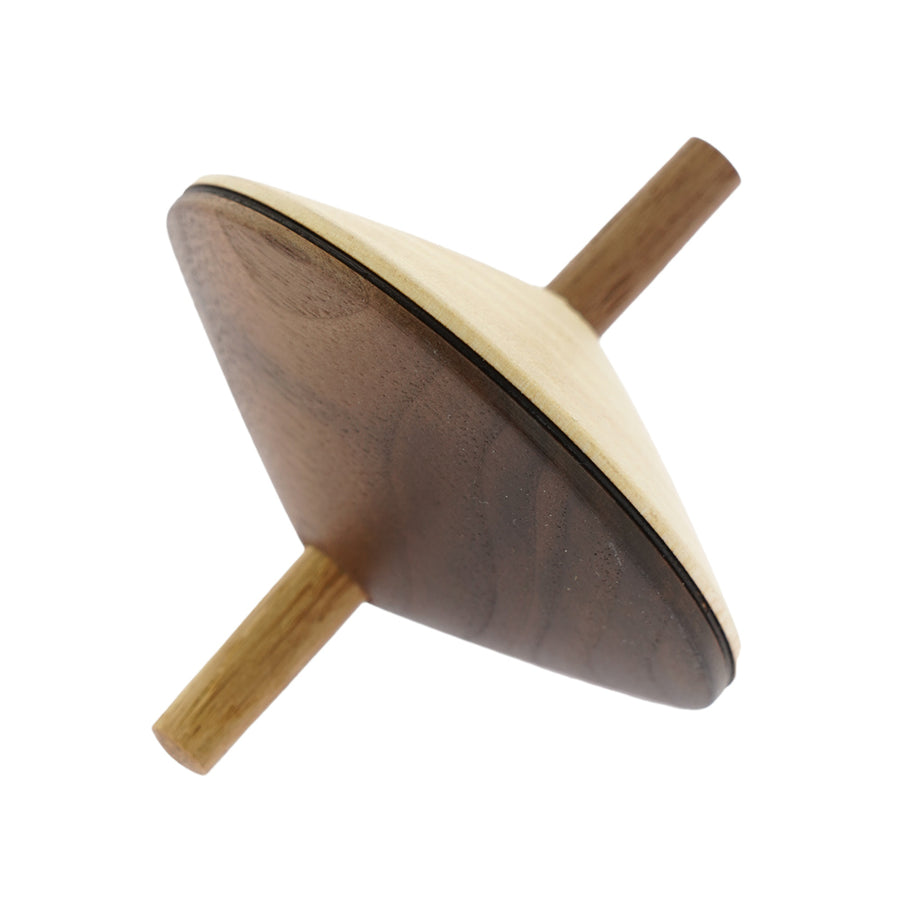 Mader plastic-free wooden wendelin spinning top toy on a white background