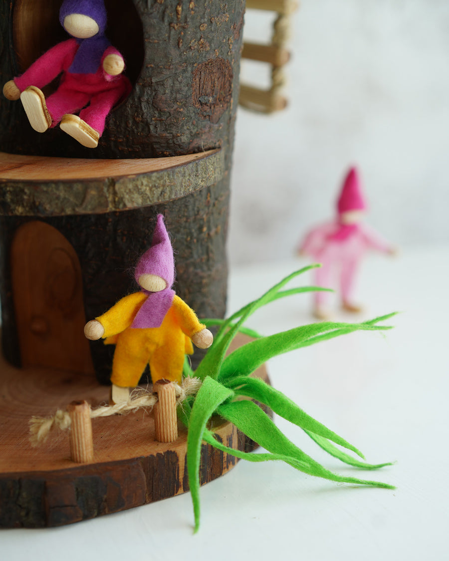 Close up of one of the green felt plants on the Magic Wood Tree Cave