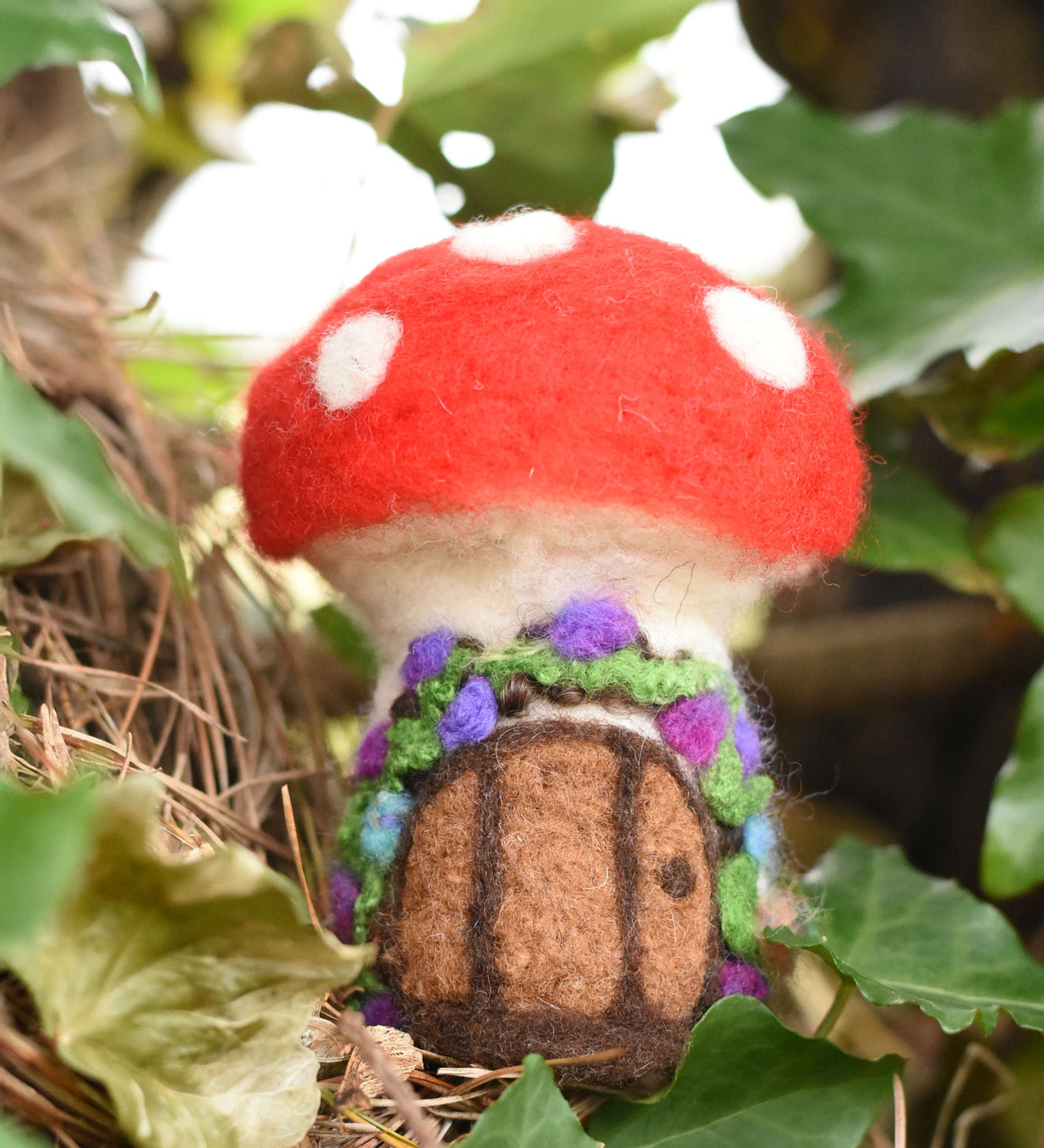 The Makerss Small Toadstool House Needle Felt Kit showing the final product created using the kit. 