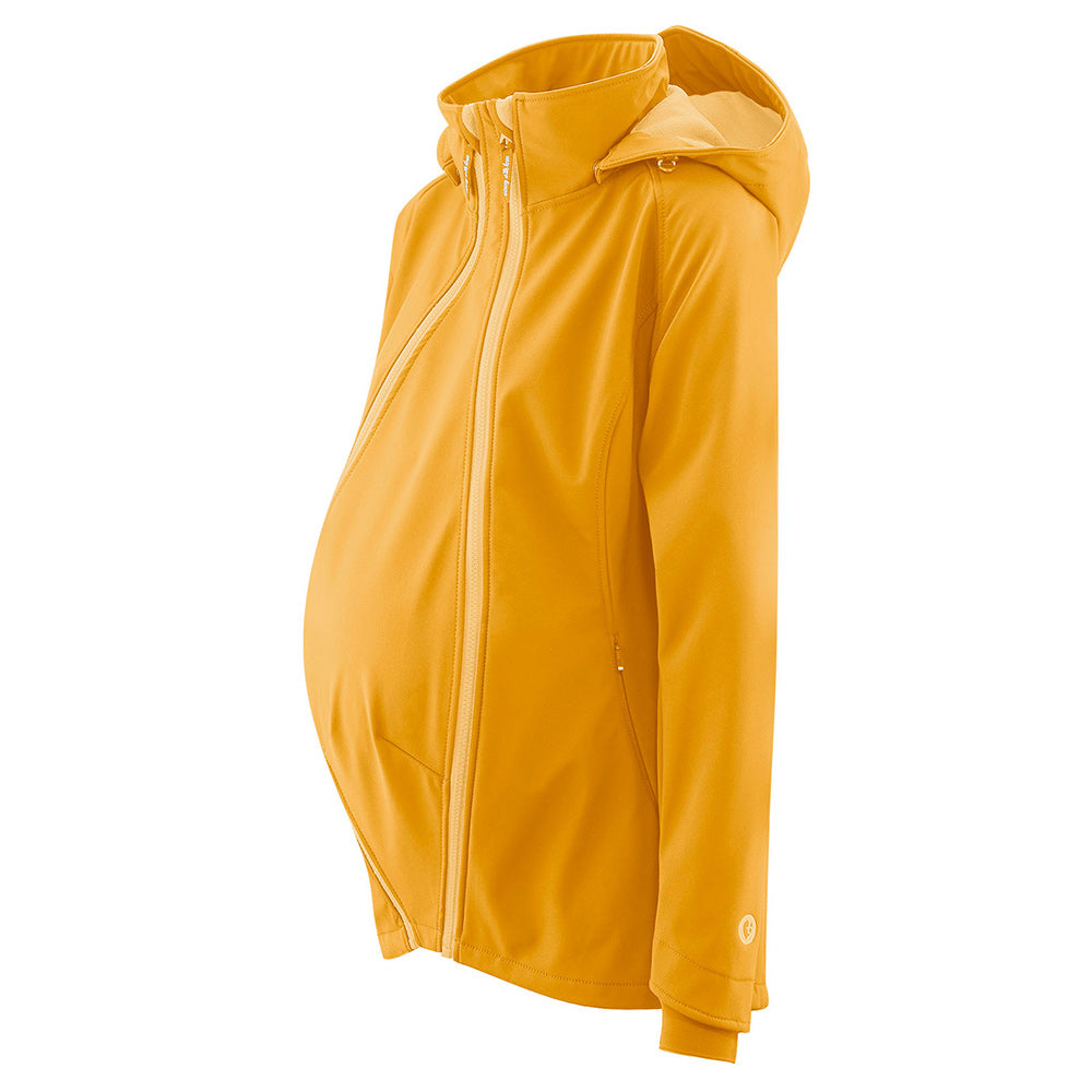 Mamalila Softshell Mustard Babywearing & Maternity Jacket worn with a pregnancy panel on a white background