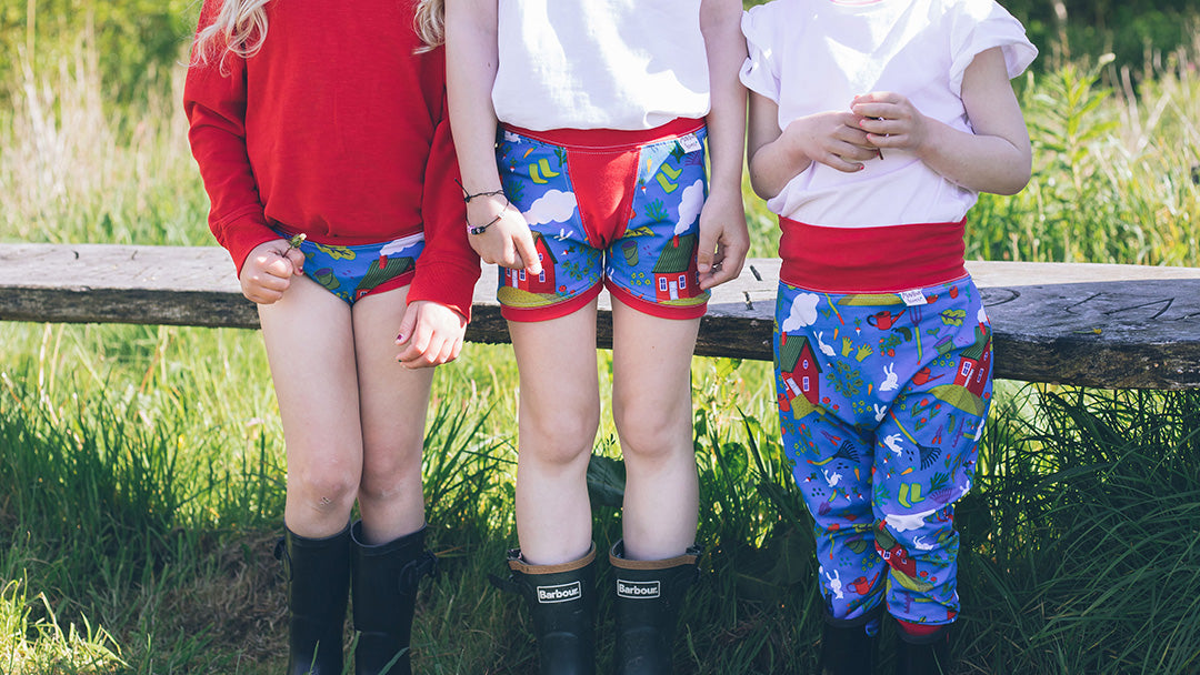 Three kids wearing Martha Loves ethical underwear