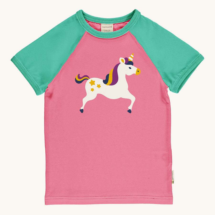 Maxomorra Children's Organic Cotton Unicorn Raglan Short Sleeve Top. A vibrant pink fabric with a fun unicorn print on the chest, with green piping on the neck and green sleeves