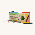 All 12 of the Medenka beeswax crayon colours displayed next to the box. 