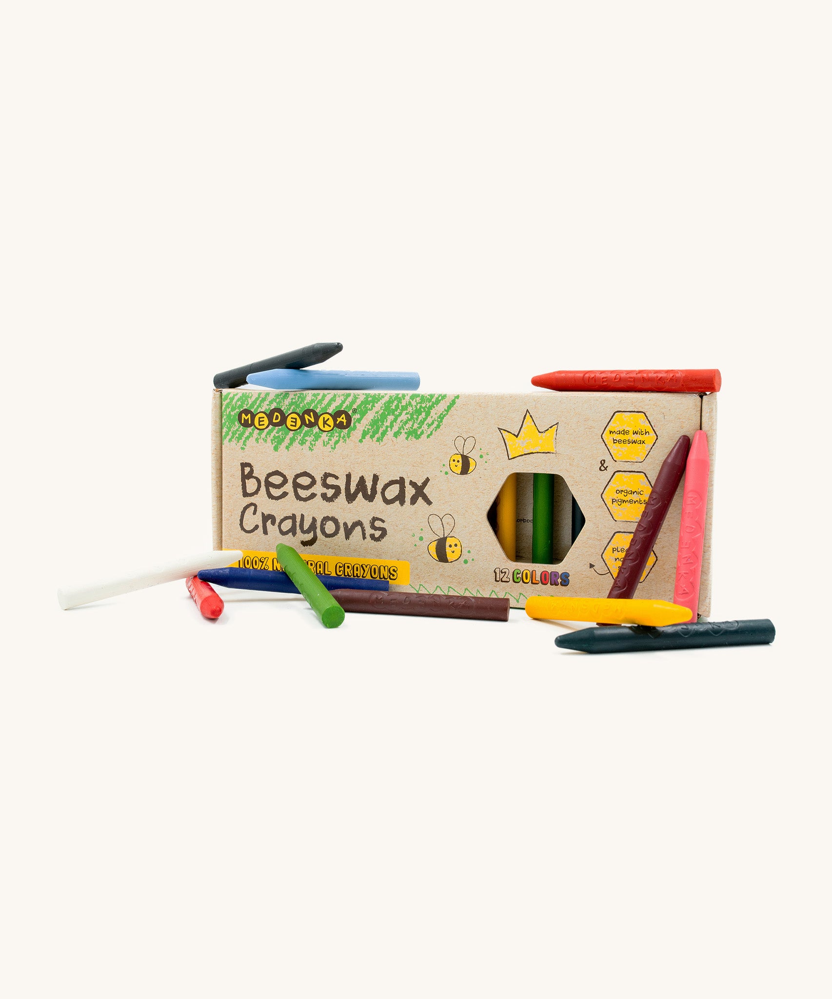 All 12 of the Medenka beeswax crayon colours displayed next to the box. 