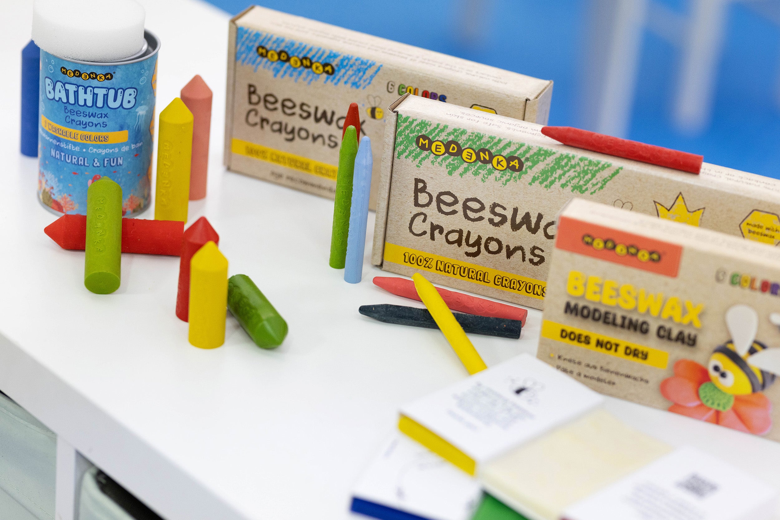 A display of the Medenka beeswax crayon and modelling clay range.