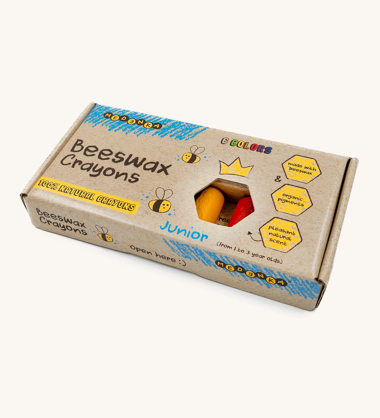 The Medenka junior crayons, made from 100% natural beeswax, in a cardboard box.