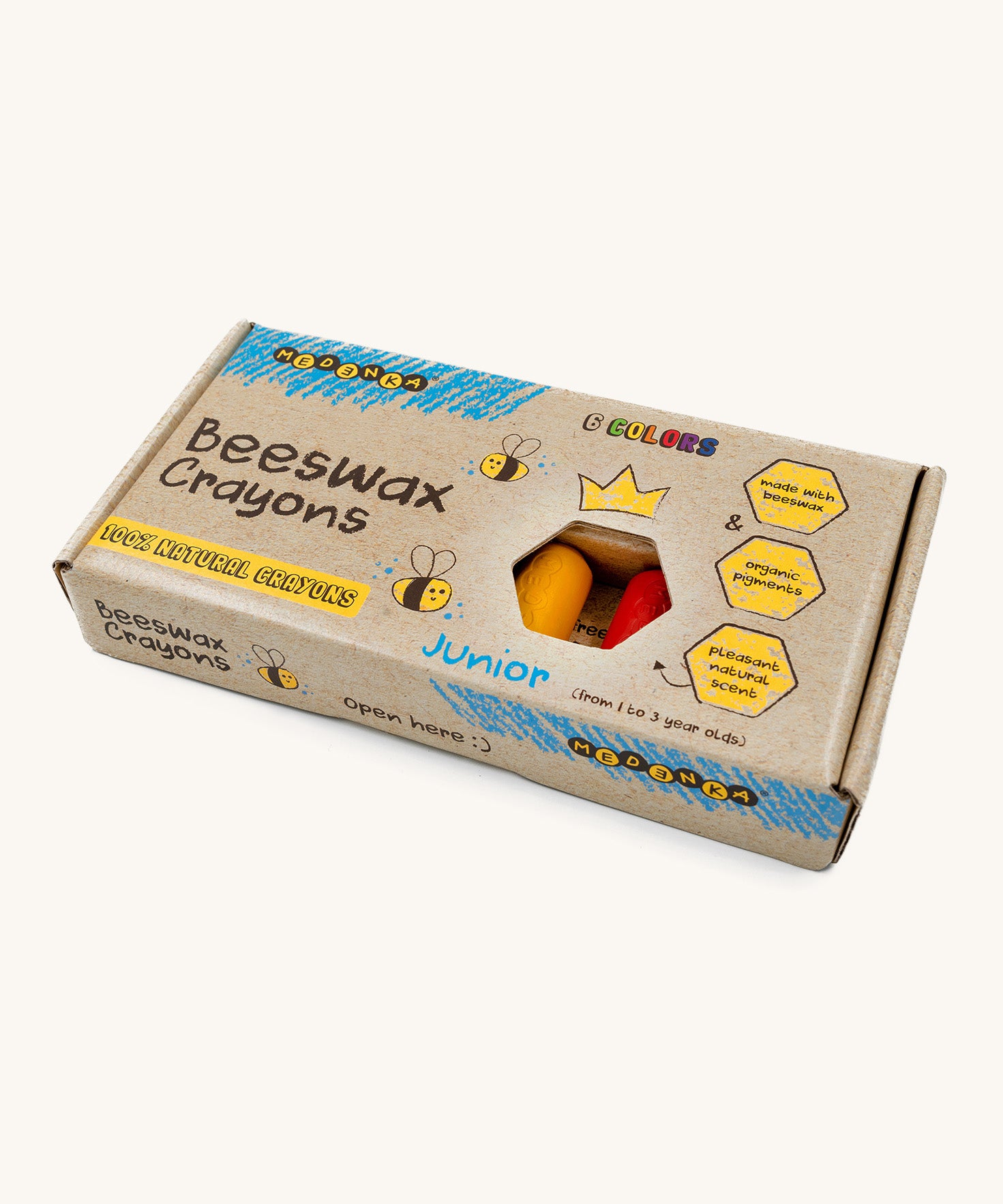 The Medenka junior crayons, made from 100% natural beeswax, in a cardboard box.