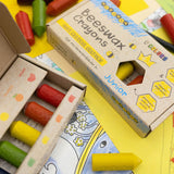 The Medenka natural beeswax crayons in their cardboard boxes.