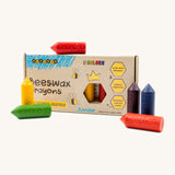 Colourful Medenka beeswax crayons next to their cardboard packaging. 