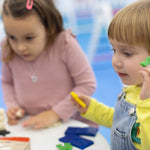 Children moulding their own creations from the Medenka beeswax modelling clay. 