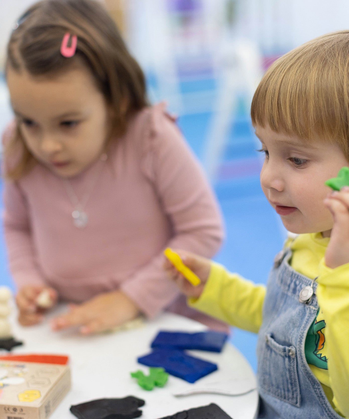 Children moulding their own creations from the Medenka beeswax modelling clay. 