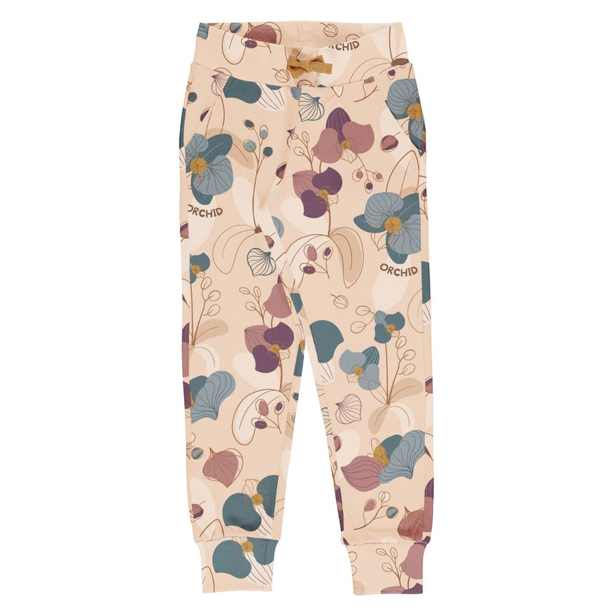 Meyadey kid's organic cotton lined slim pants in the Tropical Orchid print on a white background