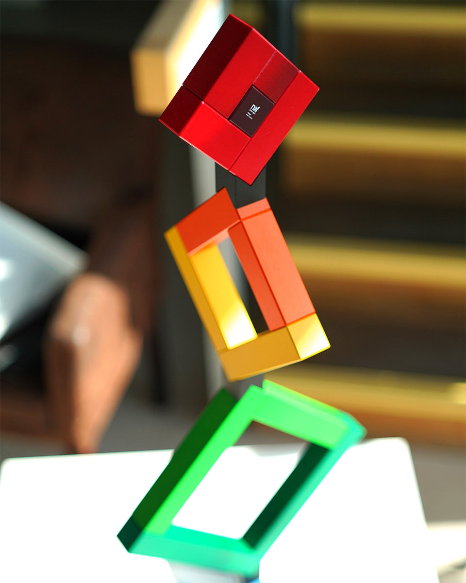 Close up of Naef Angular construction toy showing the black connector piece helping the structure balance.