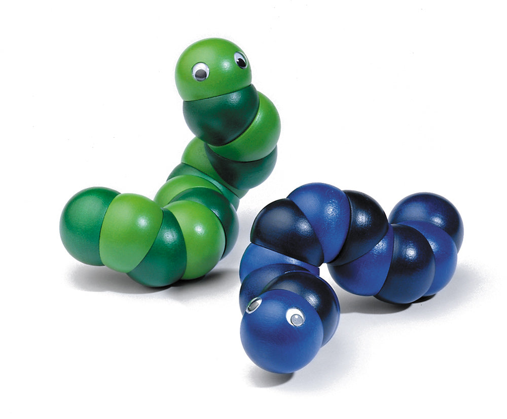 Blue and Green Naef Juba worm toys laying on a white background.