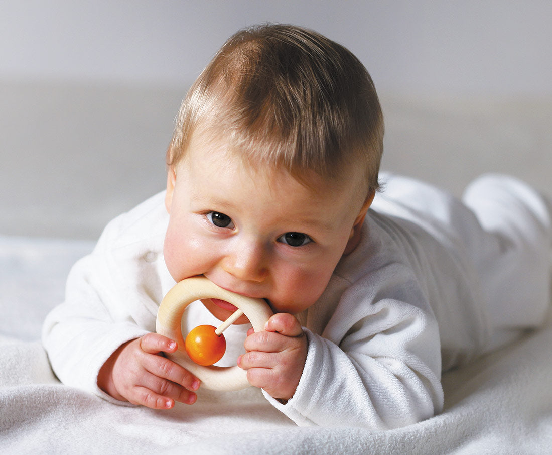 Baby playing with Kauring baby teether