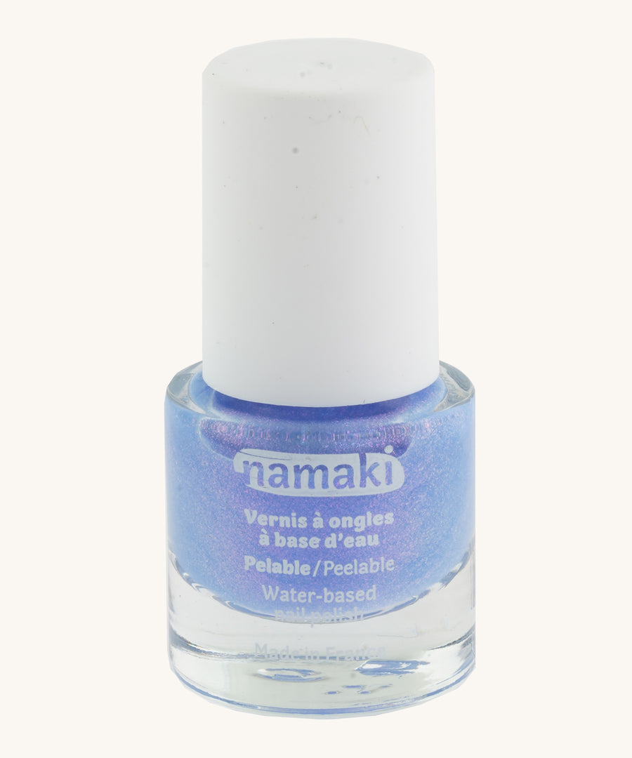 Blue Namaki nail polish from the fairy moonlight set on a cream background.