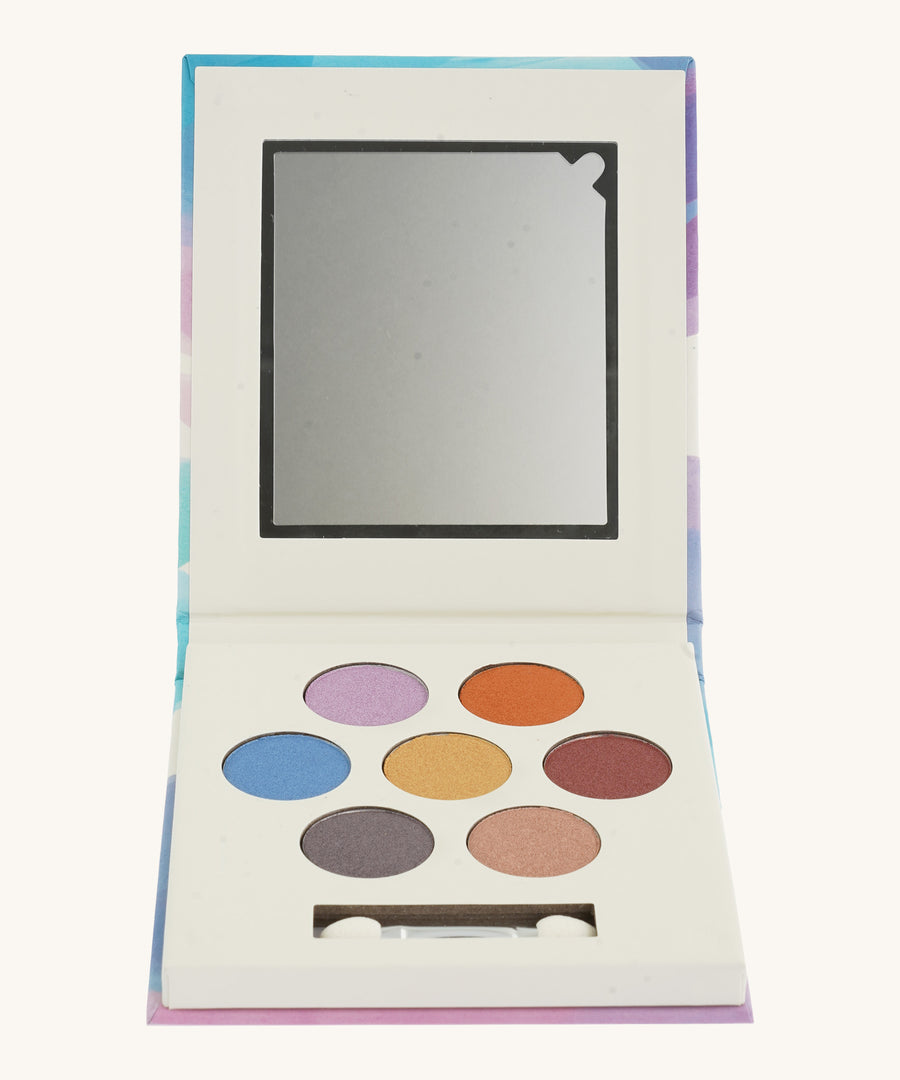 A open Namaki eye shadow palette on a cream background