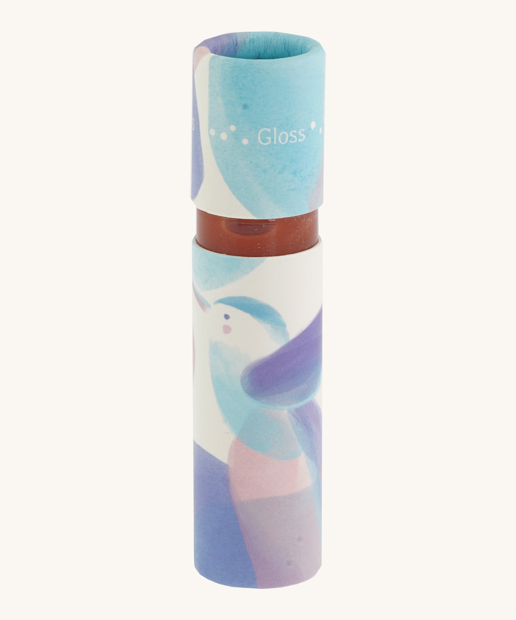 A close up of the Namaki lip gloss on a cream background