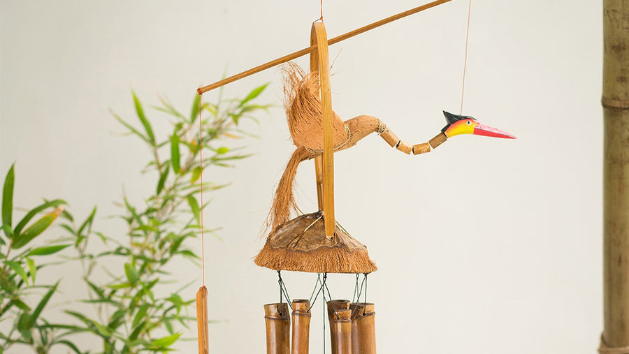 Namaste wooden windchime with nodding wooden bird on top