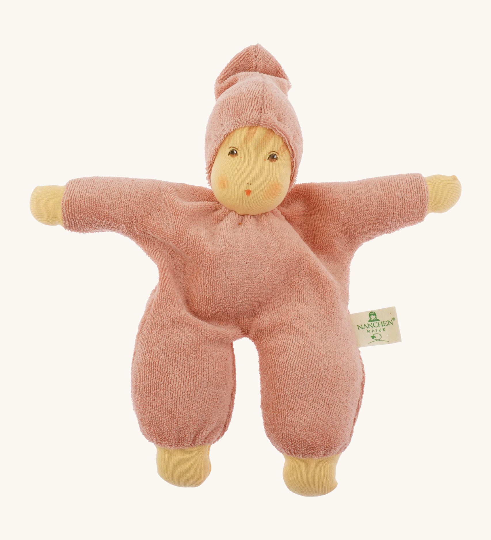 Nanchen Waldorf Cuddle Doll - Rose, a pink organic doll on a cream background. 