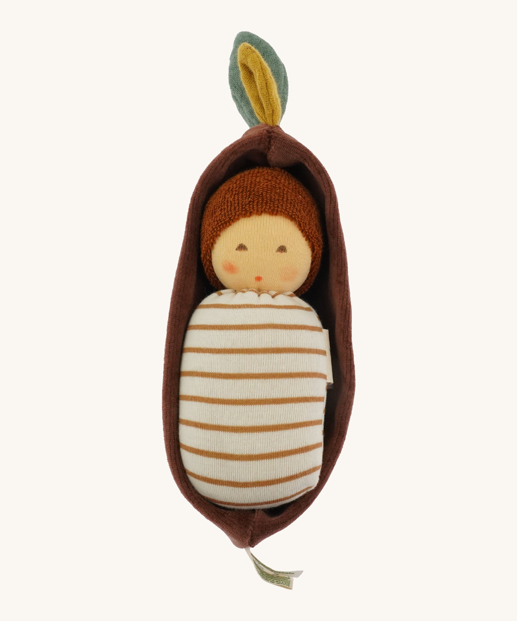 Nanchen Oak Baby Waldorf Doll - Stripes. A little organic grasping doll in a brown velvet cradle on a cream background.