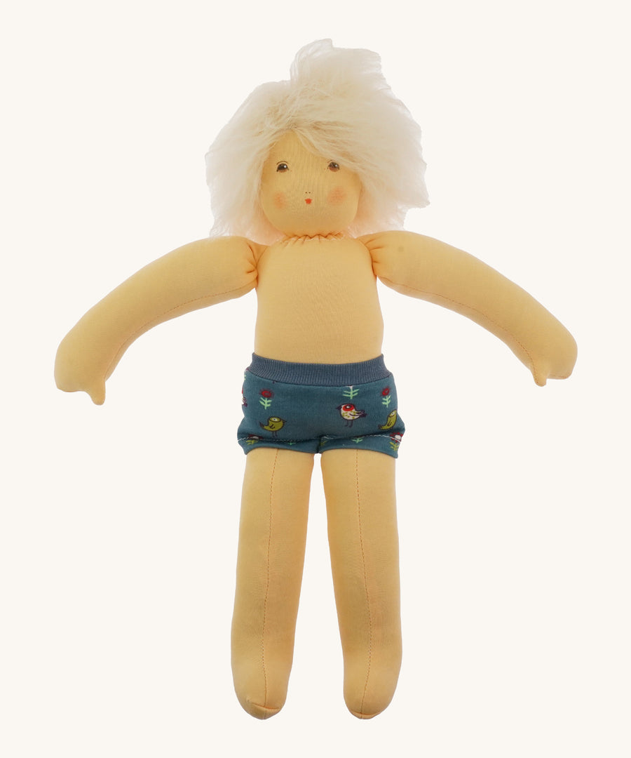 Nanchen Waldorf Doll - Lotte, an organic doll wearing blue pants.