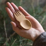 A Bambu Bamboo Spork pictured in an adult's hand