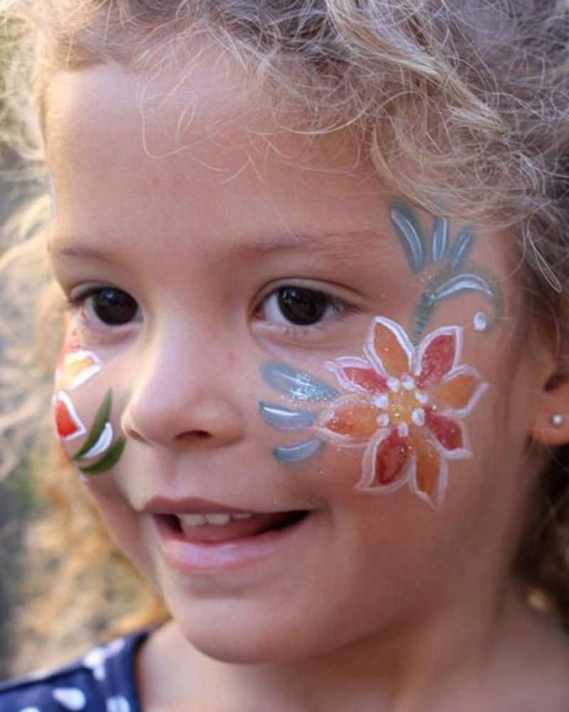 Young girl with a colourful Natural Earth face paint pattern around her eye