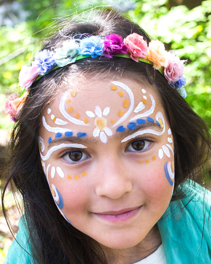 Close up of a girl with Natural Earth eco-friendly face paint in white