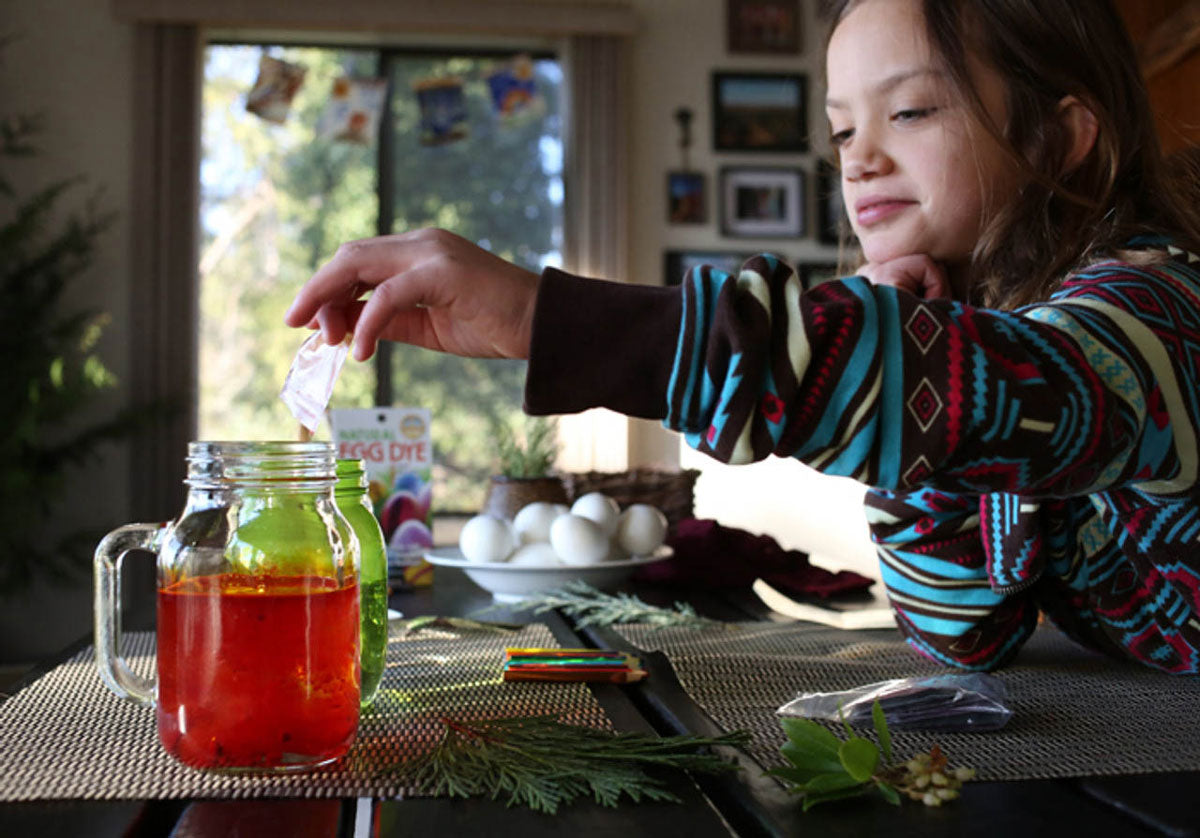 child using the Natural Earth Paint Egg Dye Kit